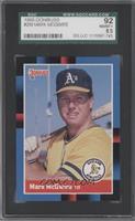 Mark McGwire (Last Line Begins with Olympic) [SGC 92 NM/MT+ 8.5]