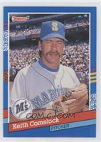 Keith Comstock (3 Yellow Stripes on Right Border)