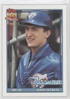 John Olerud (A* Before Copyright; Barely Visible 40th Anniversary Logo on Back)