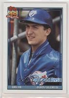 John Olerud (A* Before Copyright; Barely Visible 40th Anniversary Logo on Back)