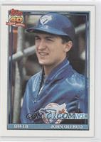 John Olerud (A* Before Copyright; Barely Visible 40th Anniversary Logo on Back)