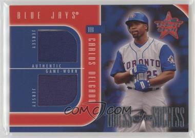 2002 Leaf Rookies And Stars - Dress For Success #DS-3 - Carlos Delgado /250