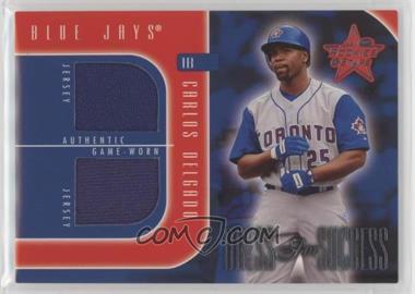 2002 Leaf Rookies And Stars - Dress For Success #DS-3 - Carlos Delgado /250