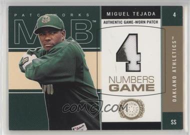 2003 Fleer Patchworks - Numbers Game - Patch #MT-NG - Miguel Tejada /300 [EX to NM]