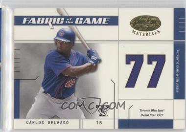 2003 Leaf Certified Materials - Fabric of the Game - Team Debut Year #FG-91 - Carlos Delgado /77