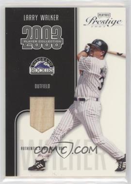 2003 Playoff Prestige - Player Collection Materials #_LAWA.1 - Larry Walker (Bat) /325 [EX to NM]