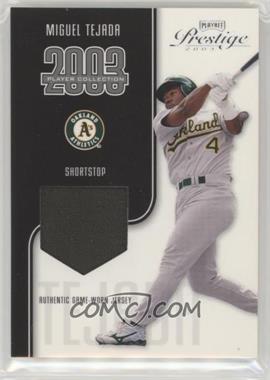 2003 Playoff Prestige - Player Collection Materials #_MITE - Miguel Tejada /325