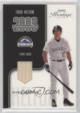 2003 Playoff Prestige - Player Collection Materials #_TOHE.1 - Todd Helton (Bat) /325