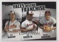 Trey Mancini, Cal Ripken Jr., Brooks Robinson #/299