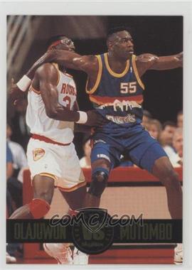 1993-94 Skybox Premium - Showdown Series #SS4 - Hakeem Olajuwon, Dikembe Mutombo