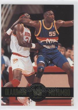 1993-94 Skybox Premium - Showdown Series #SS4 - Hakeem Olajuwon, Dikembe Mutombo