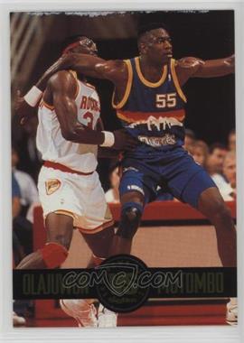 1993-94 Skybox Premium - Showdown Series #SS4 - Hakeem Olajuwon, Dikembe Mutombo