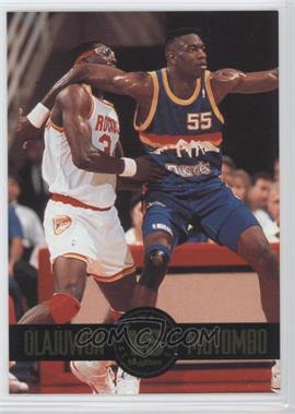 1993-94 Skybox Premium - Showdown Series #SS4 - Hakeem Olajuwon, Dikembe Mutombo