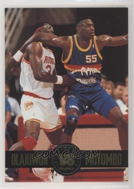 1993-94 Skybox Premium - Showdown Series #SS4 - Hakeem Olajuwon, Dikembe Mutombo