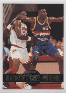 1993-94 Skybox Premium - Showdown Series #SS4 - Hakeem Olajuwon, Dikembe Mutombo