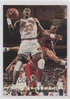 Patrick Ewing (Michael Jordan in Background)