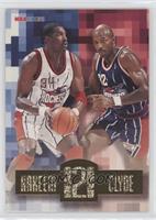 Hakeem Olajuwon, Clyde Drexler [EX to NM]