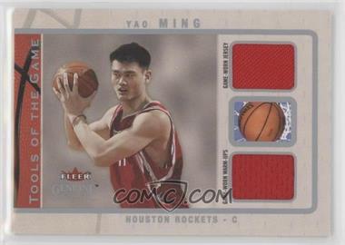2003-04 Fleer Genuine Insider - Tools of the Game - Dual Jerseys #TGD-YM - Yao Ming /99