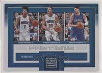 Elfrid Payton, Aaron Gordon, Nikola Vucevic