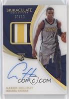 Rookie Patch Autographs - Aaron Holiday #/10