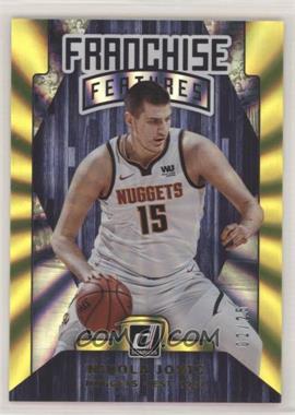 2019-20 Panini Donruss - Franchise Features - Holo Yellow Laser #21 - Nikola Jokic /25