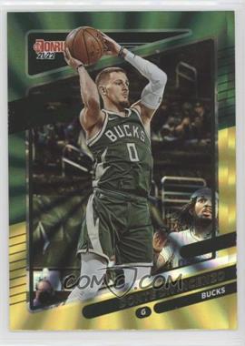 2021-22 Panini Donruss - [Base] - Holo Green & Yellow Laser #94 - Donte DiVincenzo