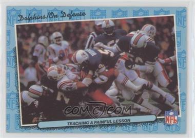 1986 Fleer Live Action Football - [Base] #44 - On Defense - Teaching a Painful Lesson
