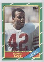 Ronnie Lott (C* on Copyright Line)