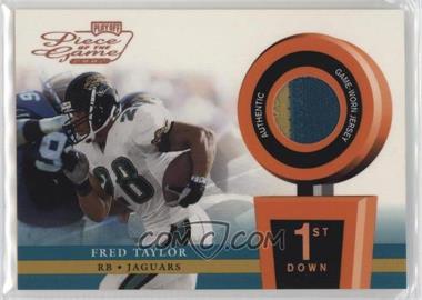 2002 Playoff Piece of the Game - Materials - 1st Down #POG-22 - Fred Taylor /250