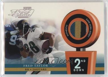 2002 Playoff Piece of the Game - Materials - 2nd Down #POG-22 - Fred Taylor /150