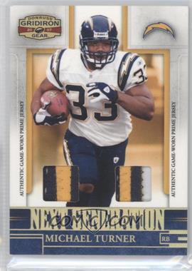 2007 Donruss Gridiron Gear - Next Generation - Combo Jerseys Prime #NG-23 - Michael Turner /50