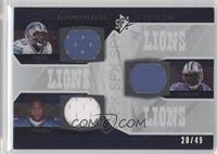 Ernie Sims, Kevin Smith, Roy Williams #/49