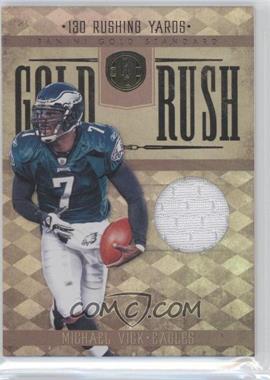 2011 Panini Gold Standard - Gold Rush - Materials #25 - Michael Vick /99