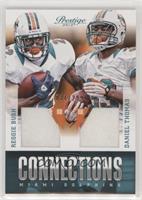 Daniel Thomas, Reggie Bush #/299