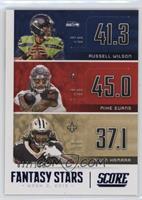 Alvin Kamara, Mike Evans, Russell Wilson #/100