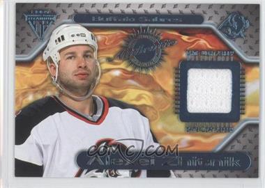 2000-01 Pacific Private Stock Titanium - Game-Used Gear #63 - Alexei Zhitnik