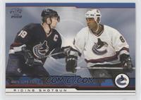 Markus Naslund, Donald Brashear