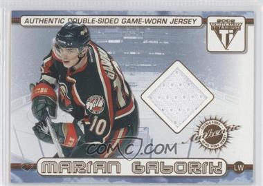 2001-02 Pacific Private Stock Titanium - Authentic Double-Sided Game-Worn Jersey #67 - Marian Gaborik, Manny Fernandez