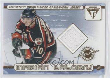 2001-02 Pacific Private Stock Titanium - Authentic Double-Sided Game-Worn Jersey #67 - Marian Gaborik, Manny Fernandez
