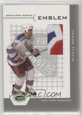 2003-04 In the Game Parkhurst Rookie - Game-Used Rookie Emblem #RE-2 - Fedor Tyutin /19