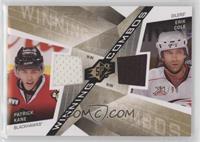 Patrick Kane, Erik Cole #/99