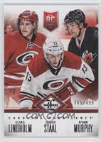 Carolina Hurricanes (Elias Lindholm, Jared Staal, Ryan Murphy) #/499