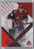 Authentic Rookies - Christian Dvorak #/25