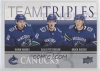 Quinn Hughes, Elias Pettersson, Brock Boeser