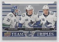 Thatcher Demko, Adam Gaudette, Quinn Hughes