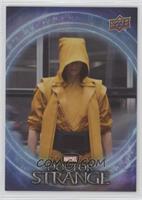 The Yellow Hooded Figure
