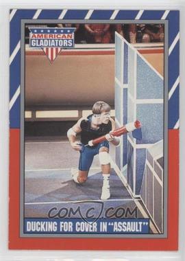 1991 Topps American Gladiators - [Base] #11 - Ducking for Cover in "Assault"
