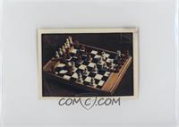 Un tablero de ajedrez durante una partida [Good to VG‑EX]