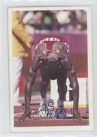 Carl Lewis (In starting blocks)