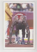 Carl Lewis (In starting blocks)